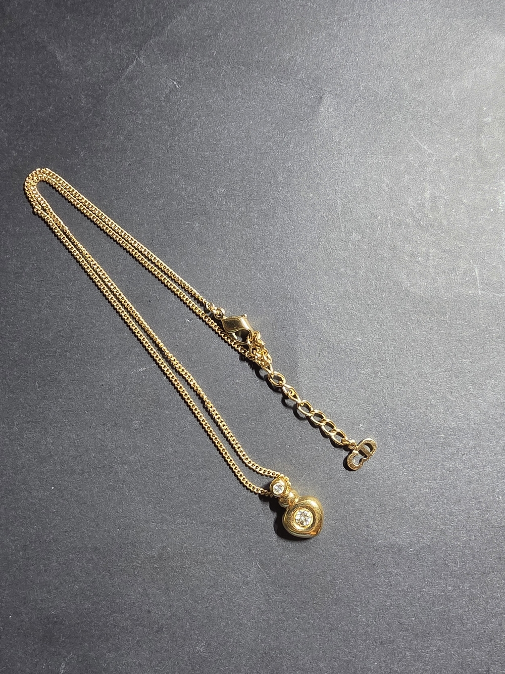 Christian Dior Gold Heart Pendant Necklace with Clear Stone
